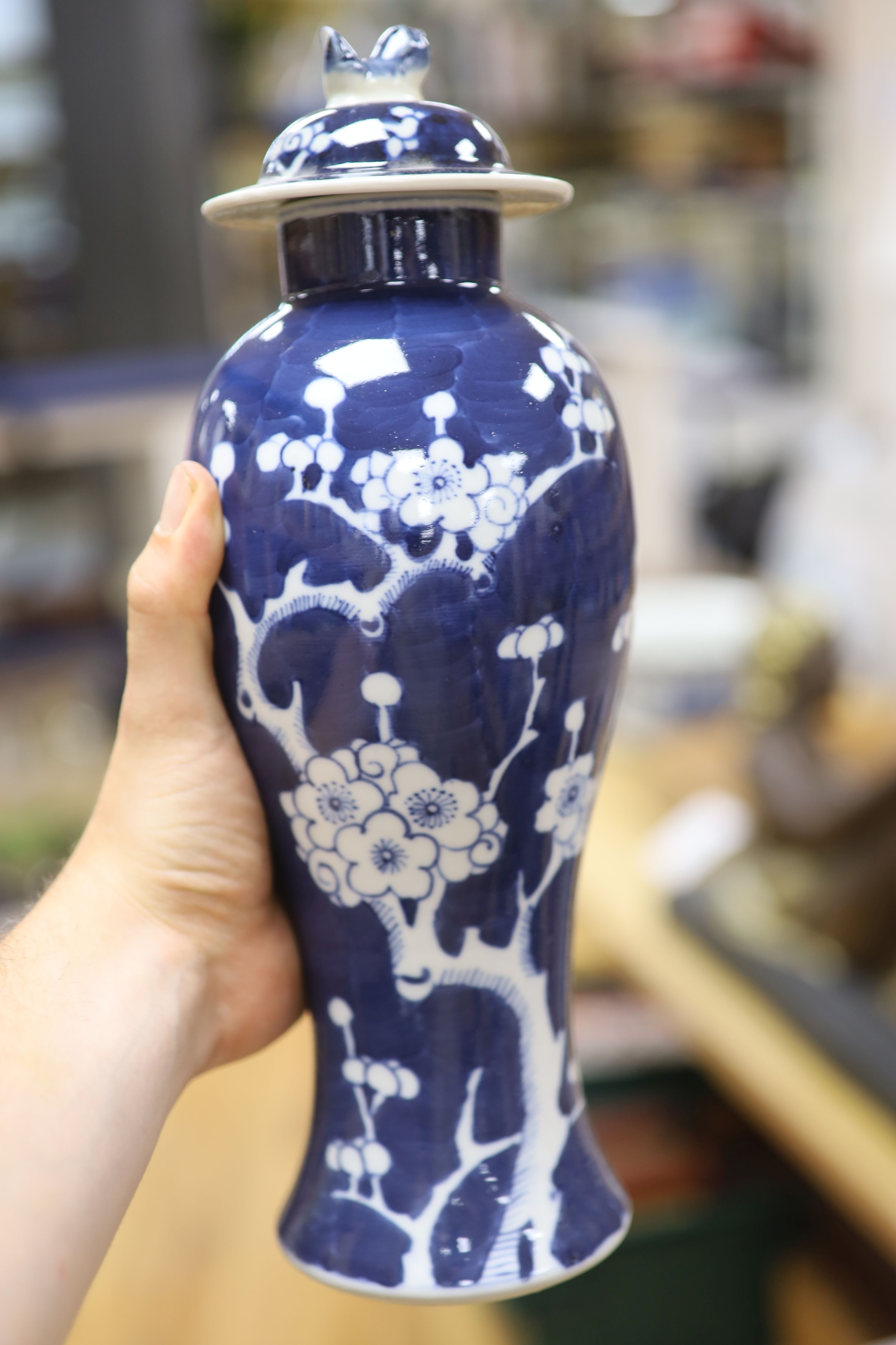 A Chinese blue and white cylindrical vase, another vase and cover and a blue and white jar and cover, together with a cloisonne vase and a bronze censer, tallest 32cm